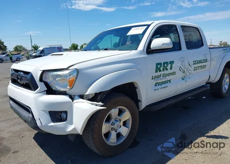 2015 Toyota Tacoma V6 из США, поврежденный, VIN 5TFMU4FN1FX031189